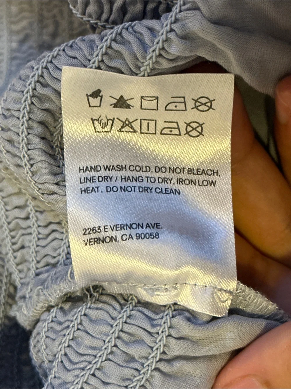 Reformation Roland Smocked Top in Mineral Blue